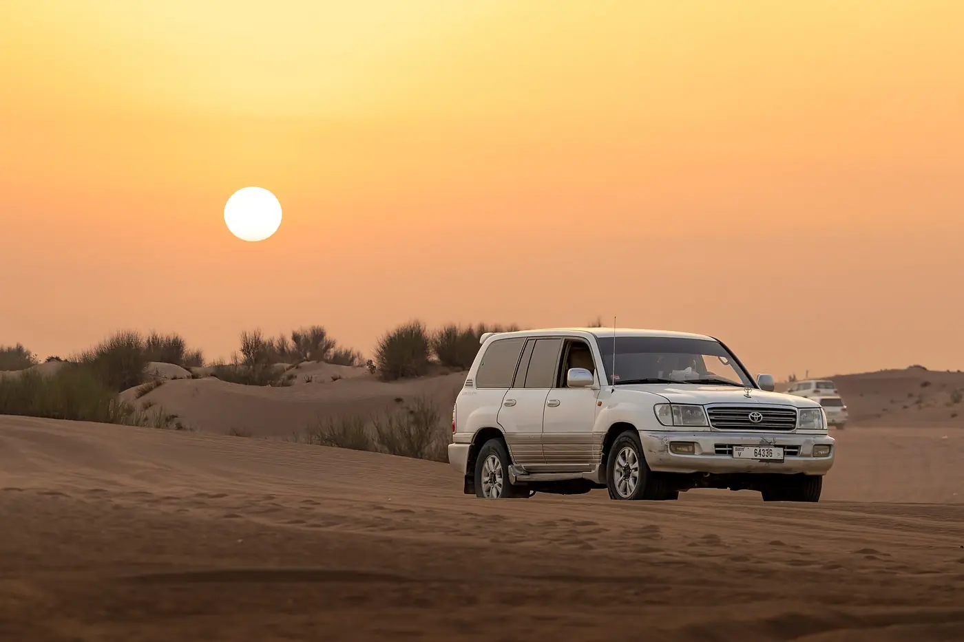 A car on Dubai Dune bashing