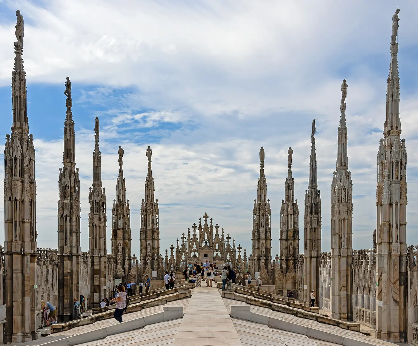 Ornate marble spires on the roof of Milan Cathedral